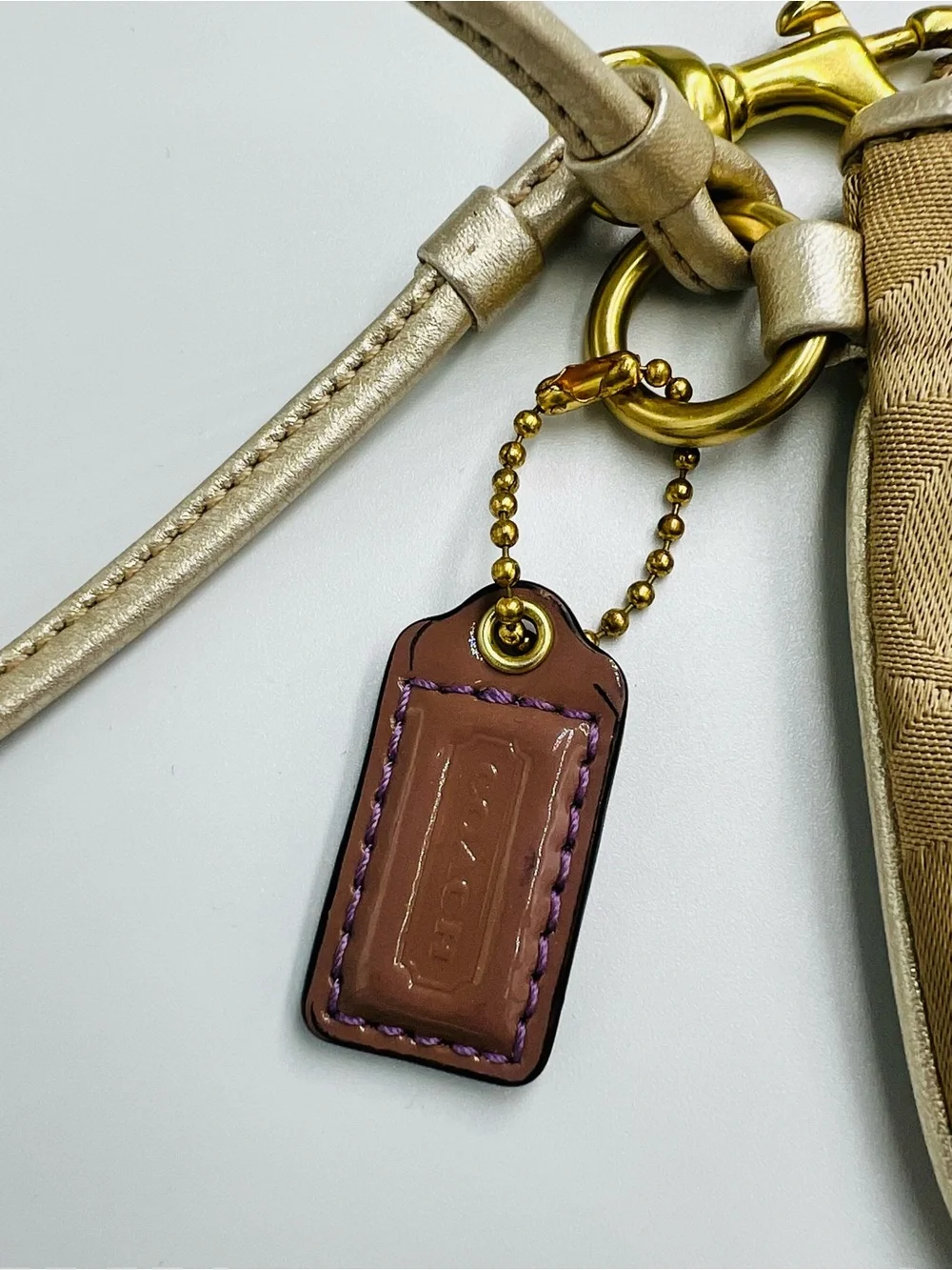 Coach Poppy Signature Wristlet